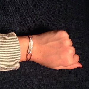 French feather bracelet with adjustable strings